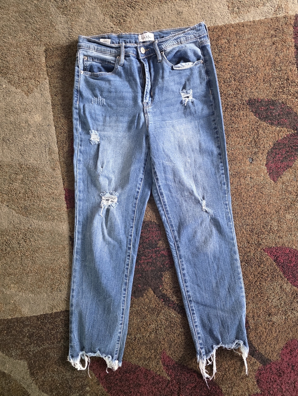 Distressed Women's Blue Denim Jeans